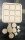 Tic-Tac-Toe oder Drei gewinnt Spiel für die Hosentasche aus Holz